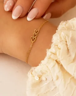 Finaste Armband love hearts triple goudkleurig Outlet