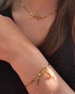 Finaste Armband met trending strikje kleur goud Fashion