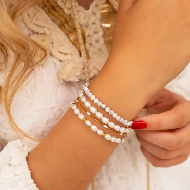Finaste Armband Met Witte Bolletjes Goudkleurig Discount
