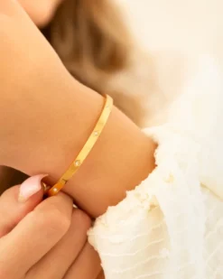Finaste Bangle met steentjes goudkleurig Clearance