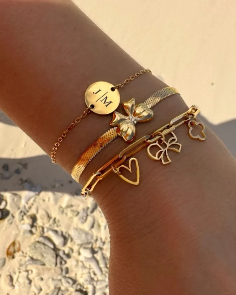 Finaste Bedelarmband bow goudkleurig New