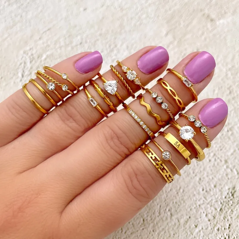 Finaste Gedraaide ring met 3 steentjes goud kleurig Outlet