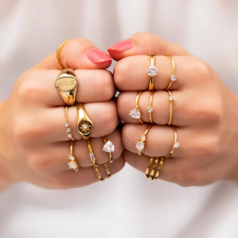 Finaste Gedraaide ring met 3 steentjes goud kleurig Outlet