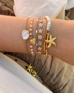 Finaste Gekleurde chain armband met zeester goudkleurig Fashion