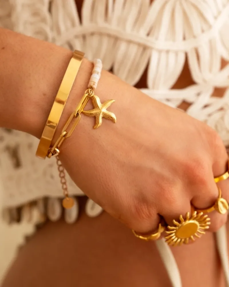 Finaste Gekleurde chain armband met zeester goudkleurig Fashion