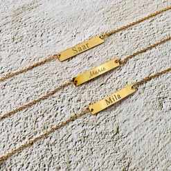 Finaste Graveerbare bar armband met sierletters goud kleurig Sale