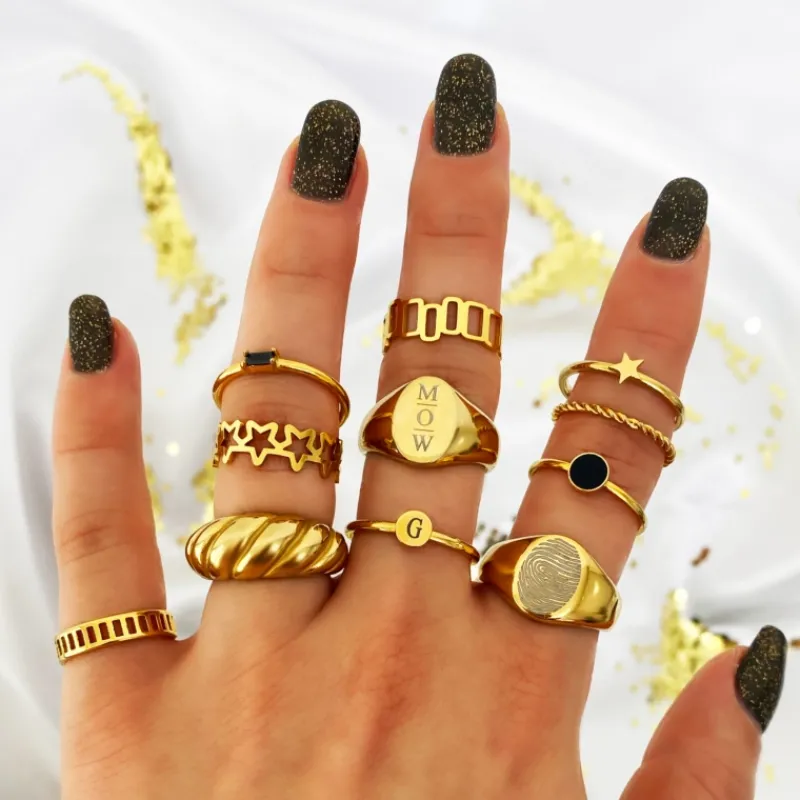 Finaste Grote zegelring 3 letters goud kleurig Clearance