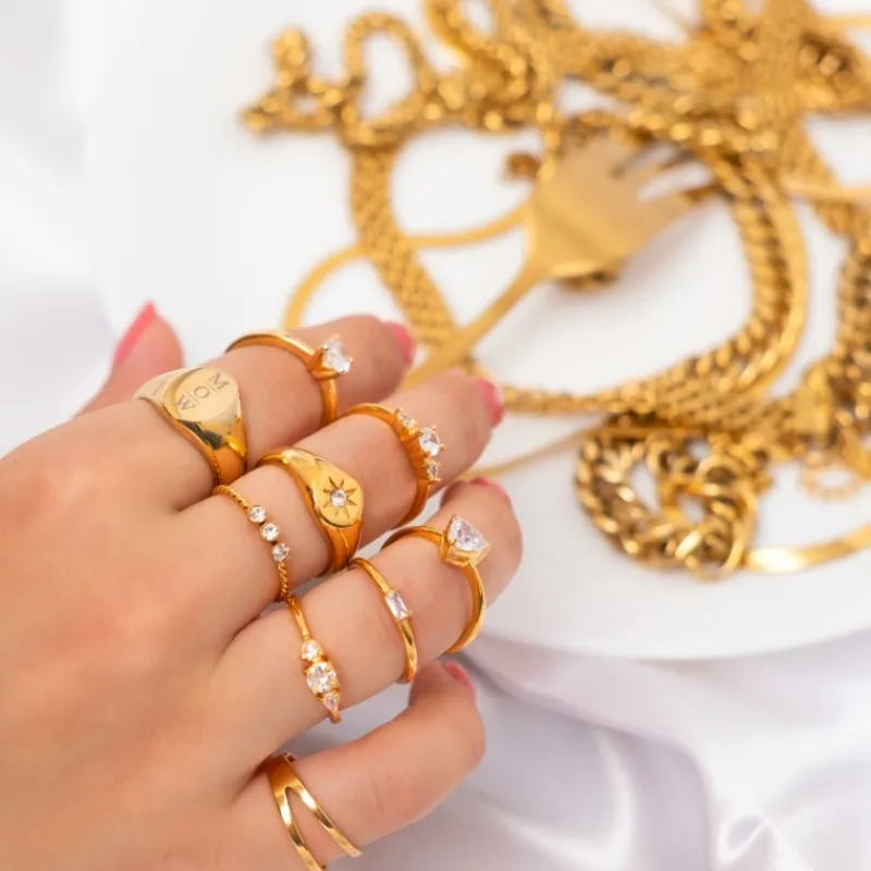Finaste Grote zegelring 3 letters goud kleurig Clearance