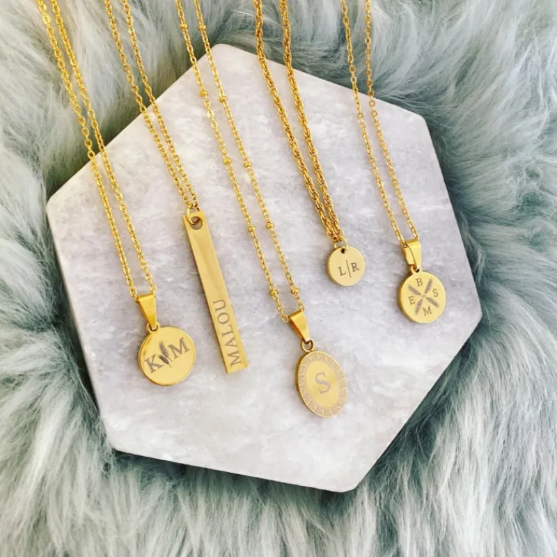 Finaste Ketting vier letters goud kleurig Best