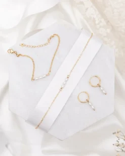 Finaste Oorringen twee pareltjes verguld sterling zilver Discount