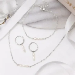 Finaste Oorringen twee pareltjes sterling zilver Discount