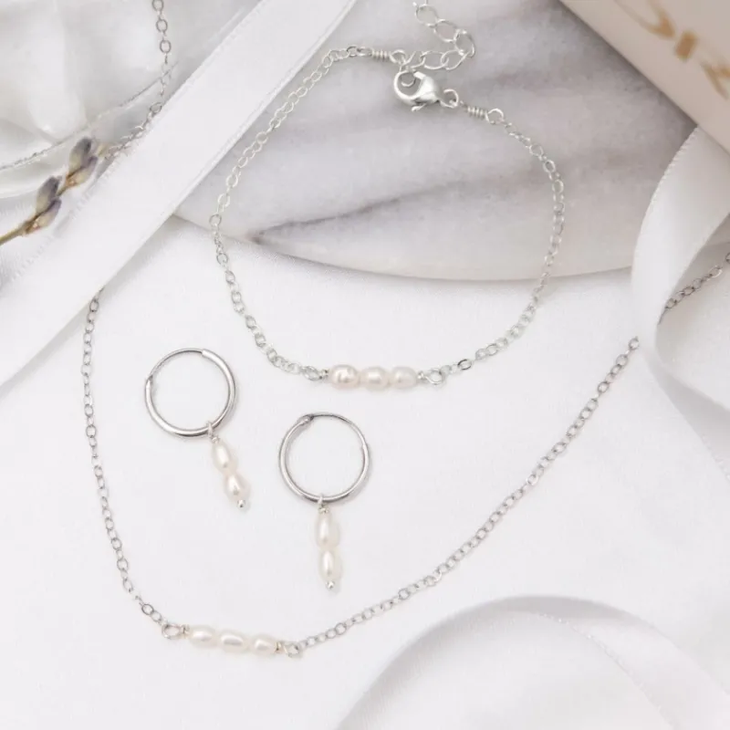 Finaste Oorringen twee pareltjes sterling zilver Discount