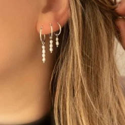 Finaste Oorringen vier pareltjes sterling zilver Sale