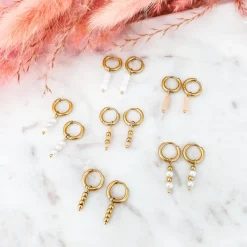 Finaste Oorringetjes roze steentjes goud kleurig New