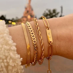 Finaste Schakelarmband gedraaid goudkleurig Best