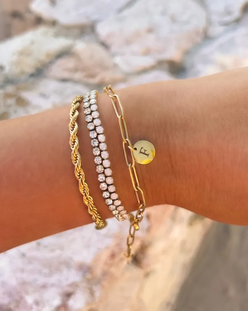 Finaste Schakelarmband gedraaid goudkleurig Best