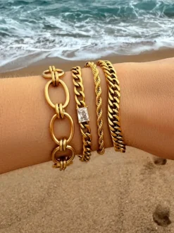 Finaste Schakelarmband gedraaid goudkleurig Best