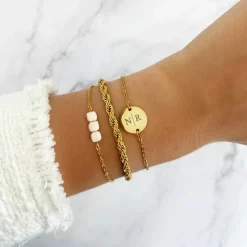 Finaste Schakelarmband gedraaid goudkleurig Best