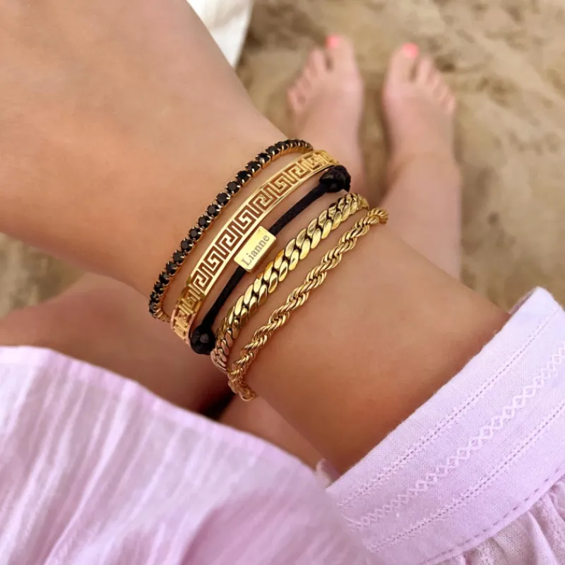Finaste Schakelarmband gedraaid goudkleurig Best