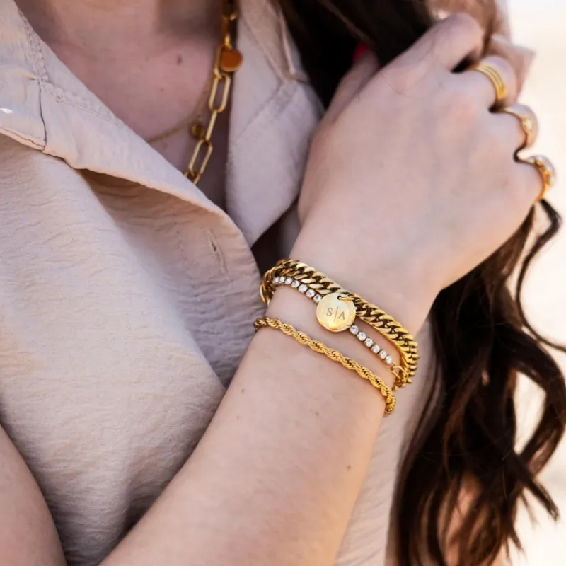 Finaste Schakelarmband gedraaid goudkleurig Best