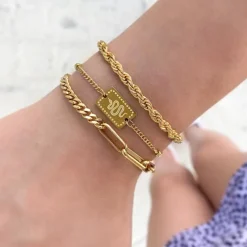 Finaste Schakelarmband gedraaid goudkleurig Best
