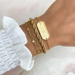 Finaste Schakelarmband gedraaid goudkleurig Best