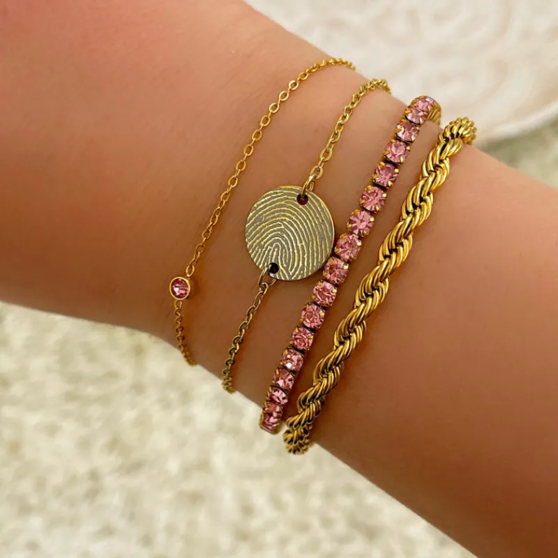 Finaste Schakelarmband gedraaid goudkleurig Best