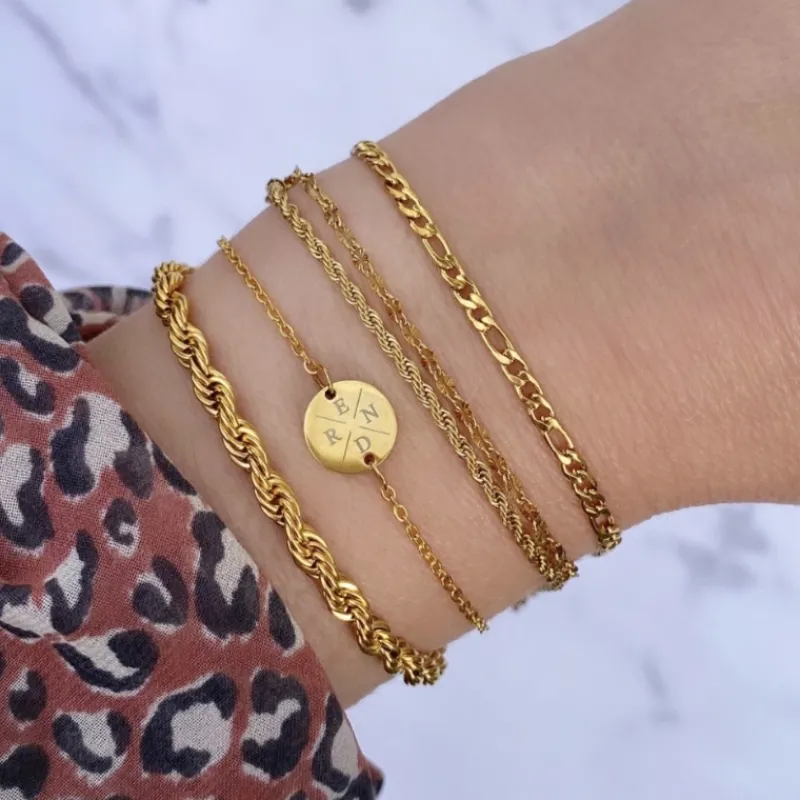 Finaste Schakelarmband gedraaid goudkleurig Best