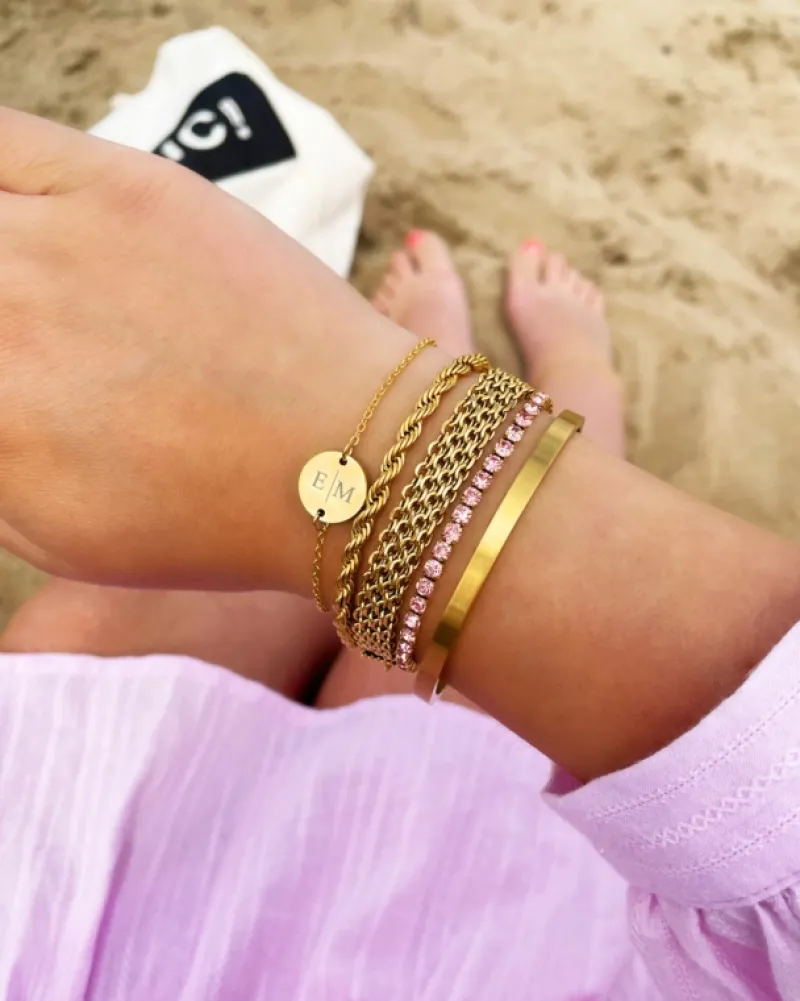 Finaste Schakelarmband gedraaid goudkleurig Best