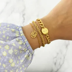 Finaste Schakelarmband gedraaid goudkleurig Best