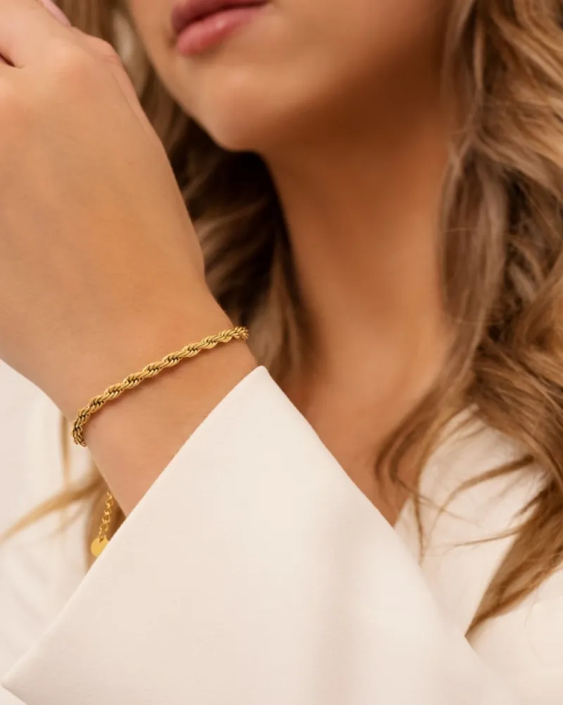 Finaste Schakelarmband gedraaid goudkleurig Best