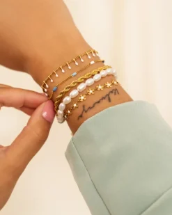 Finaste Schakelarmband gedraaid goudkleurig Best