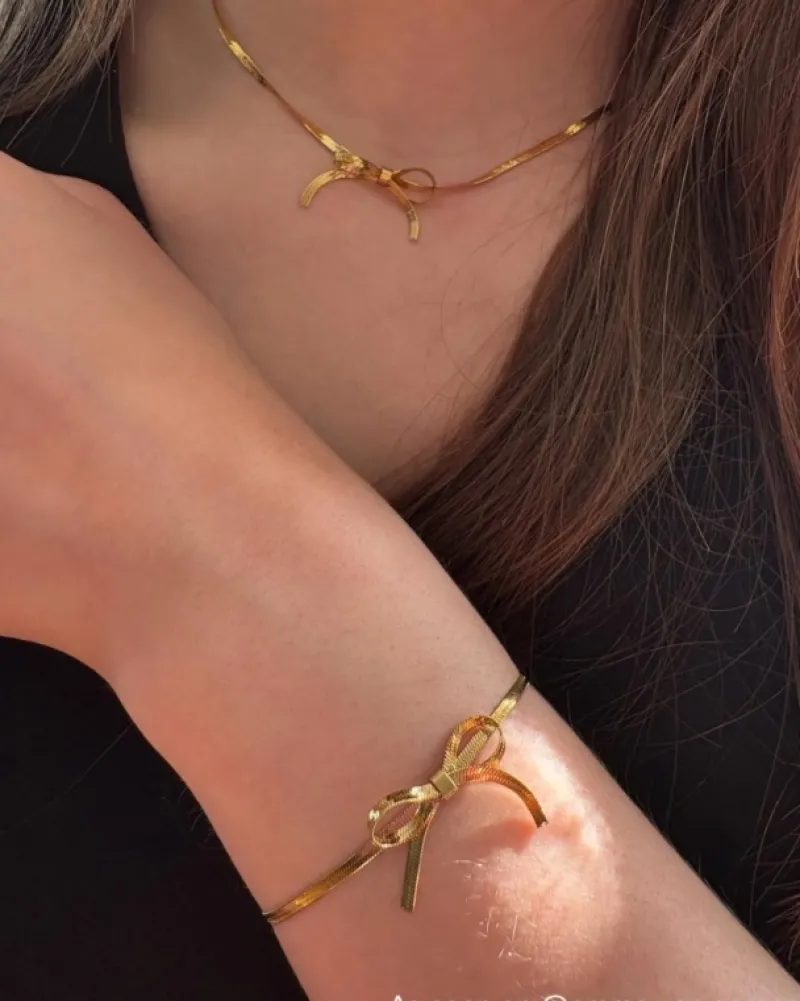 Finaste Trendy bow necklace goudkleurig Discount