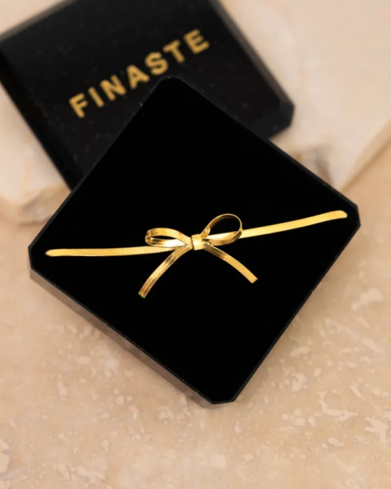 Finaste Trendy bow necklace goudkleurig Discount