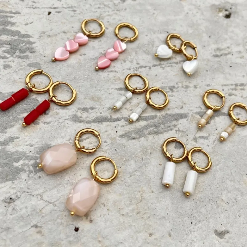 Finaste White sea shell earrings goldplated New